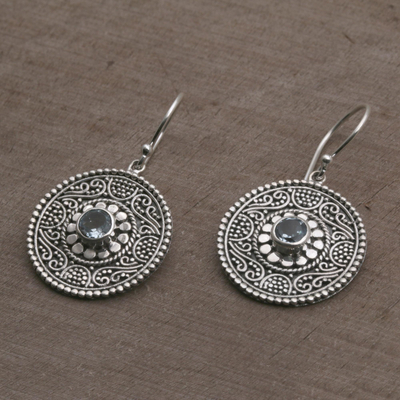 Blue topaz dangle earrings, 'Mystic Shields' - Blue Topaz and 925 Silver Circular Dangle Earrings from Bali