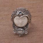 Blue topaz cocktail ring, 'Celuk Prince' - Blue Topaz and Carved Bone Sterling Silver Celuk Ring