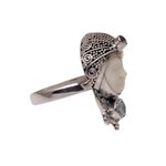 Blue topaz cocktail ring, 'Celuk Prince' - Blue Topaz and Carved Bone Sterling Silver Celuk Ring