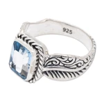 Blue topaz single stone ring, 'Razorleaf' - Blue Topaz Leaf-Themed Single Stone Ring from Bali
