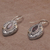 Gold-accented garnet dangle earrings, 'Defiant Beauty' - Gold-accented Garnet Swirl Motif Dangle Earrings from Bali