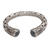 Blue topaz cuff bracelet, 'Borobudur Dew' - Blue Topaz and Sterling Silver Borobudur Motif Cuff Bracelet thumbail