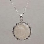 Sterling silver pendant necklace, 'Stellar Lovers' - Sterling Silver and Bone Sun and Moon Necklace from Bali