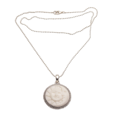 Sterling silver pendant necklace, 'Stellar Lovers' - Sterling Silver and Bone Sun and Moon Necklace from Bali