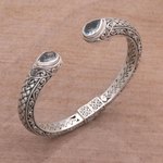 Blue topaz cuff bracelet, 'Blue Topaz Tears' - Blue Topaz and Sterling Silver Cuff Bracelet from Indonesia