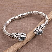 Blue topaz cuff bracelet, 'River Pebbles' - Blue Topaz Pebble Motif Cuff Bracelet from Bali