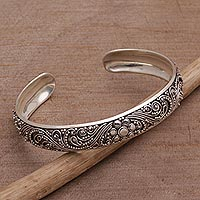 Sterling silver cuff bracelet, 'Shrine Swirls'