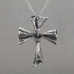 Sterling silver pendant necklace, 'Songket Cross' - Sterling Silver Songket Cloth Pendant Necklace from Bali