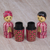 Mahogany toothpick holders, 'Lurik Wedding' (pair) - Two Cultural Mahogany Toothpick Holders in Pink from Bali (image 2c) thumbail