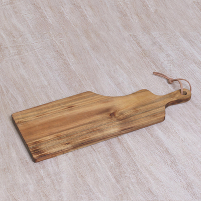 Teak wood cutting board, 'Amber Abstract' - Artisan Hand-Carved Abstract Teak Wood Cutting Board