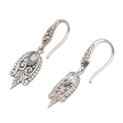Gold accent blue topaz dangle earrings, 'Dewdrop Caress' - Balinese Gold Accent Sterling Silver Blue Topaz Earrings