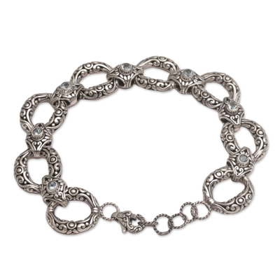 Blue topaz link bracelet, 'Garden Chain' - Blue Topaz and Sterling Silver Link Bracelet from Bali