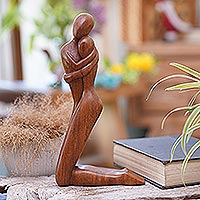 Wood sculpture, 'Together In Love' - Handcrafted Suar Wood Love-Themed Sculpture from Bali