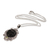 Peridot pendant necklace, 'Skull Stare in Black' - Peridot and Bone Black Skull Pendant Necklace from Bali (image 2c) thumbail
