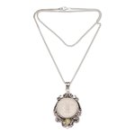 Peridot pendant necklace, 'Moonlight Stare' - Peridot and Bone Moon Pendant Necklace from Bali