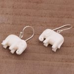 Bone dangle earrings, 'White Elephant' - Sleek Cow Bone Carved Elephant Earrings with Silver Hooks