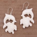 Bone dangle earrings, 'Friends Among the Waves' - Bone Dangle Earrings with Dolphin and Tortoise Theme