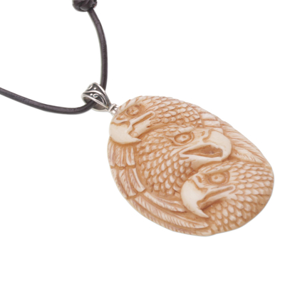 Bone pendant necklace, 'Eagle Trio' - Handcrafted Eagle-Themed Bone Pendant Necklace from Bali