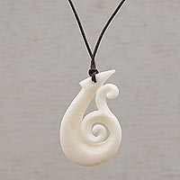 Bone pendant necklace, 'Wavy Hook' - Handcrafted Swirl Motif Bone Pendant Necklace from Bali