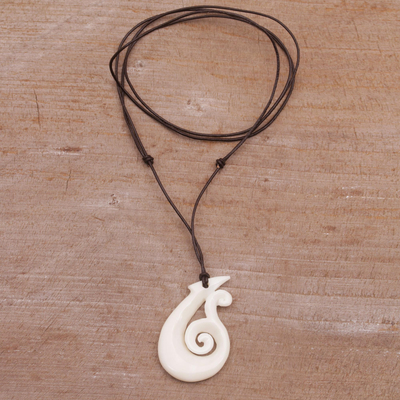 Bone pendant necklace, 'Wavy Hook' - Handcrafted Swirl Motif Bone Pendant Necklace from Bali