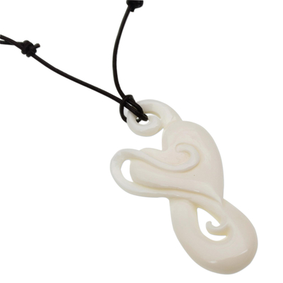 Bone pendant necklace, 'Untouched Heart' - Handcrafted Heart-Shaped Bone Pendant Necklace from Bali