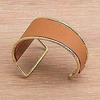 Leather and brass cuff bracelet, 'Golden Tan Swirl' - Golden Tan Leather and Brass Cuff Bracelet from Bali