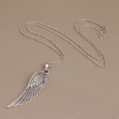 Sterling silver pendant necklace, 'Right Wing' - Wing-Shaped Sterling Silver Pendant Necklace from Bali