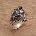 Men's sterling silver ring, 'Wolf's Gaze' - Men's Sterling Silver and Garnet Wolf Ring from Bali