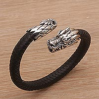 Men's sterling silver and leather cuff bracelet, 'Braided Dragon' - Men's Sterling Silver and Leather Dragon Bracelet from Bali