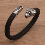 Men's sterling silver and leather cuff bracelet, 'Braided Tiger' - Men's Sterling Silver and Leather Tiger Bracelet from Bali