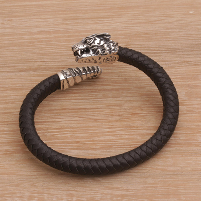 Men's sterling silver and leather cuff bracelet, 'Braided Tiger' - Men's Sterling Silver and Leather Tiger Bracelet from Bali