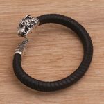 Men's sterling silver and leather cuff bracelet, 'Braided Tiger' - Men's Sterling Silver and Leather Tiger Bracelet from Bali