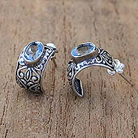 Blue topaz half-hoop earrings, 'Vine Curves' - Half-Hoop Silver Earrings with One Carat of Blue Topaz Gems