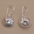 Blue topaz dangle earrings, 'Dainty Shields' - Round Sterling Silver Earrings with Blue Topaz Gems (image 2d) thumbail