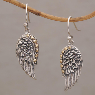Gold accented sterling silver dangle earrings, 'Gleaming Swan Wings' - Gold Accent Sterling Silver Wing Dangle Earrings from Bali