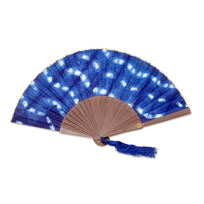 Tie-dyed cotton fan, 'Andira' - Tie Dyed Blue and White Cotton and Wood Hand Fan