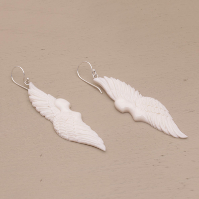 Bone dangle earrings, 'Goddess Wings' - Handcrafted Wing-Shaped Bone Dangle Earrings from Bali