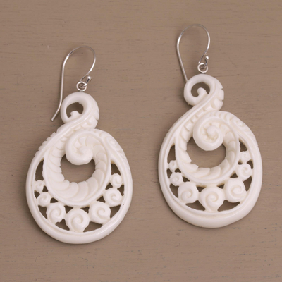 Bone dangle earrings, 'Swirling Scales' - Handcrafted Bone Spiral Motif Dangle Earrings from Bali