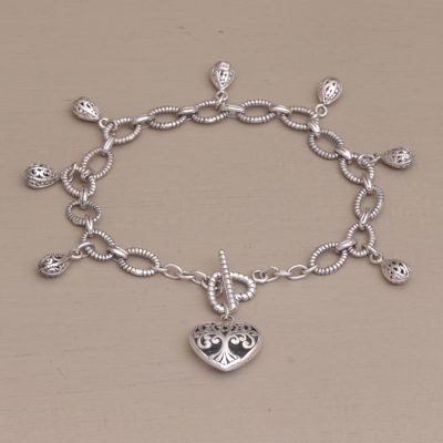 Sterling silver charm bracelet, 'The Garden in my Heart' - Romantic Sterling Silver Link Bracelet with Heart Charm