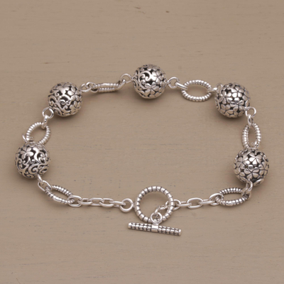 Sterling silver link bracelet, 'Garden Orbs' - Floral Sterling Silver Link Bracelet from Bali