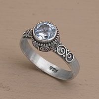 Blue topaz solitaire ring, 'Spiral Crown' - Blue Topaz and Sterling Silver Solitaire Ring from Bali