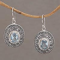 Blue topaz dangle earrings, 'Plumeria Shield' - Four Carat Blue Topaz Floral Sterling Silver Earrings