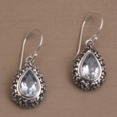 Blue topaz dangle earrings, 'Jepun Blue' - Frangipani Flower Dangle Earrings with Blue Topaz Gems