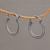 Sterling silver hoop earrings, 'On Rotation' (1 inch)