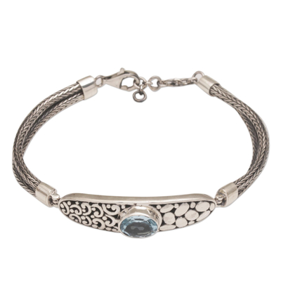 Blue topaz pendant bracelet, 'Kebun Raya Walk' - Pendant Style Silver Bracelet with Faceted Blue Topaz