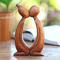 Featured review for Wood statuette, Kissing You