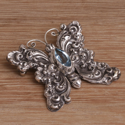 Blue topaz brooch, 'Marquise Butterfly' - Blue Topaz and Sterling Silver Butterfly Brooch from Bali