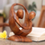 Wood sculpture, 'Cycle of Love' - Suar Wood Romantic Sculpture thumbail