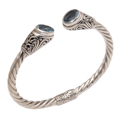 Blue topaz cuff bracelet, 'Ancient Realm' - Blue Topaz and Sterling Silver Cuff Bracelet from Bali