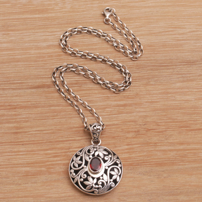 Garnet pendant necklace, 'Floral Eye in Red' - Artisan Handmade 925 Sterling Silver Garnet Pendant Necklace